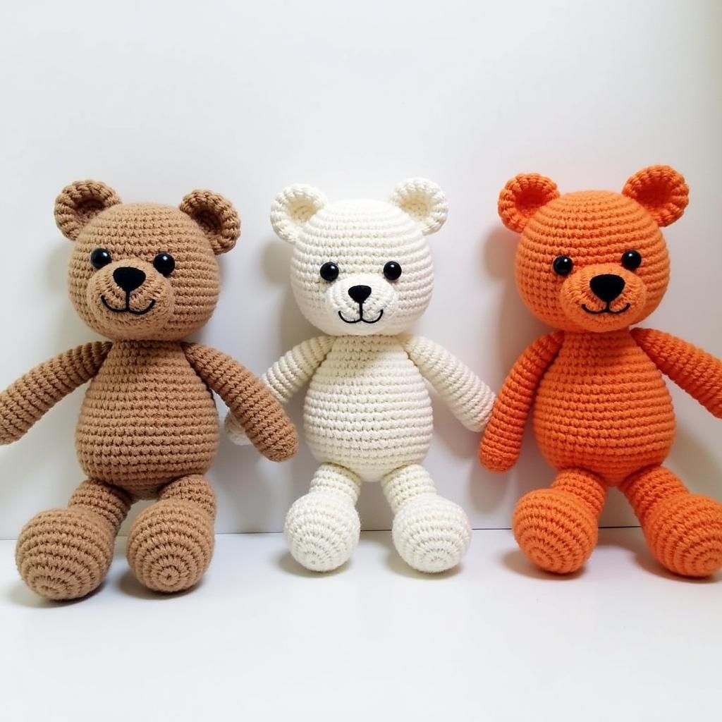 Three crocheted bears in different styles: classic, modern, and whimsical