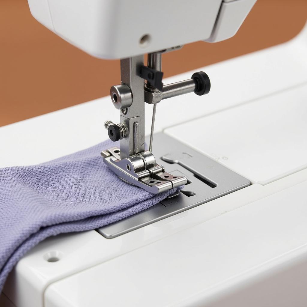 Free motion quilting foot attached to a sewing machine