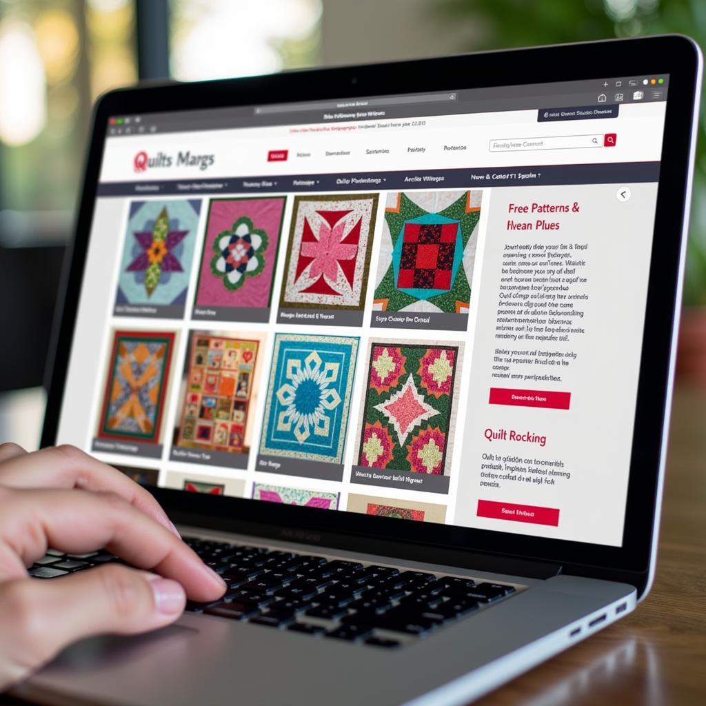 Quilt patterns displayed on a laptop screen