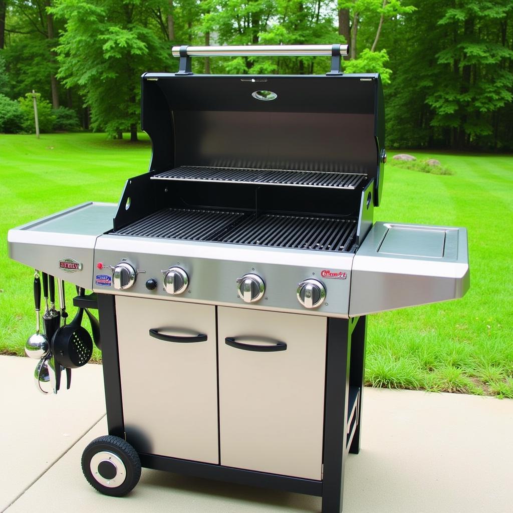 Free-standing gas grill in a backyard setting