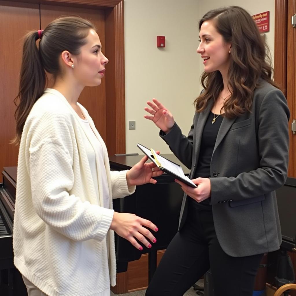 A vocal coach guiding a singer