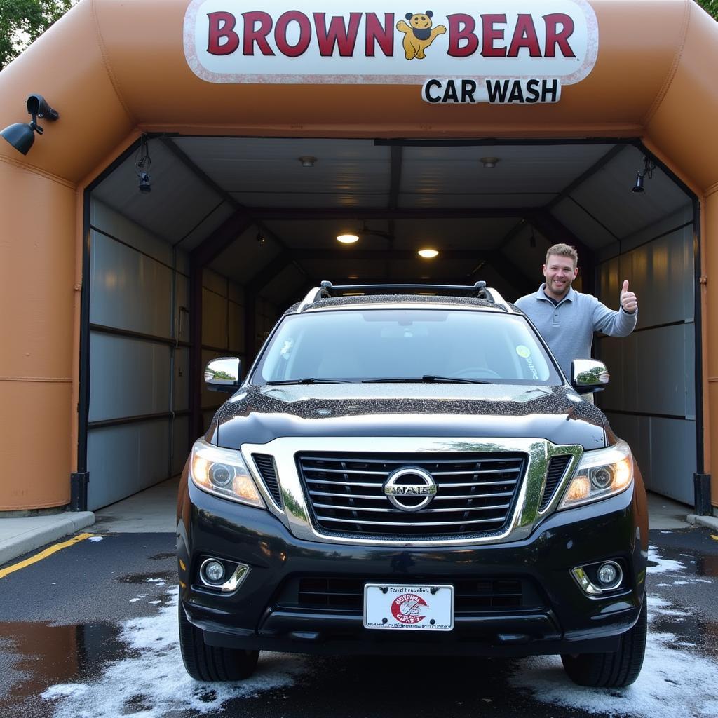 Happy Driver Leaving Brown Bear Car Wash