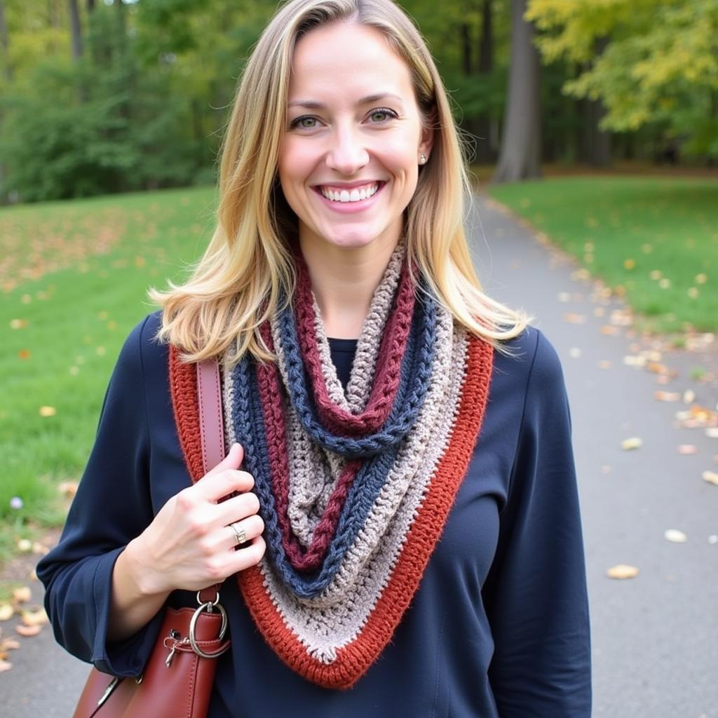 A stylish woman wearing a crocheted skinny scarf.