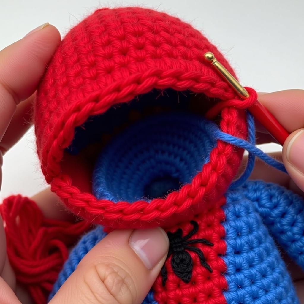 Crocheting a Spiderman amigurumi - work in progress