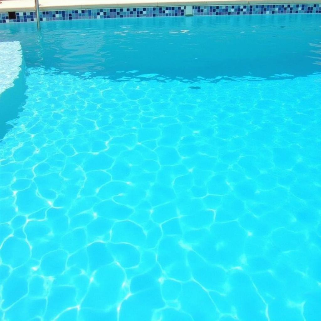 Crystal-clear metal-free pool water shimmering in the sunlight