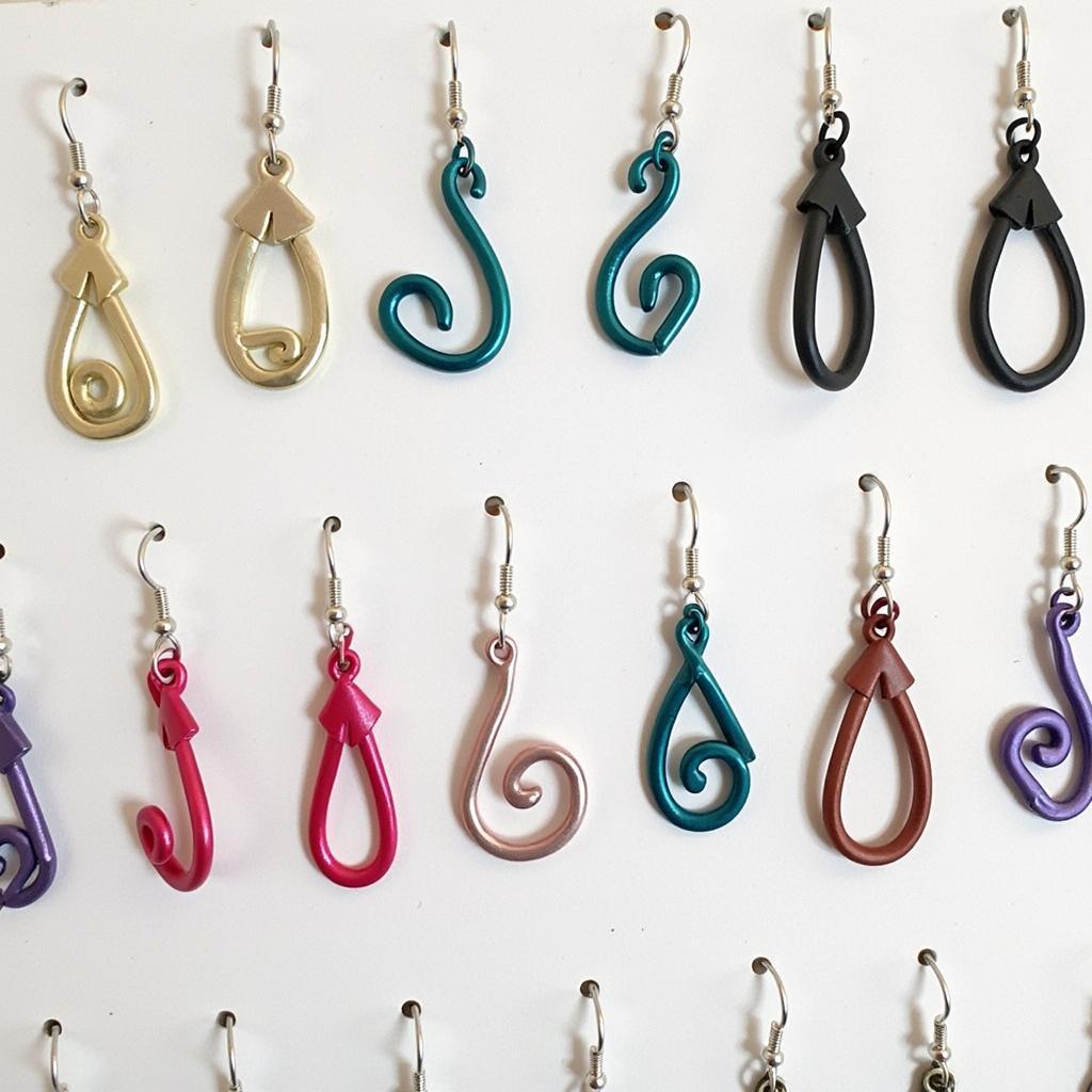 Colorful niobium hypoallergenic earrings in various vibrant hues