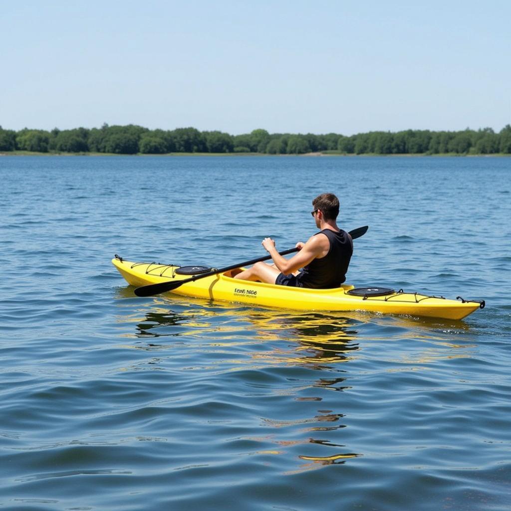 Feel Free Moken kayak gliding smoothly on calm water