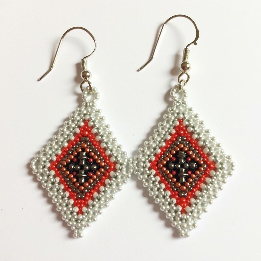 Finished Brick Stitch Earrings on a Display